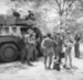 Operation Askari - Soldiers standing next to a Ratel - SANDF Documentation Centre